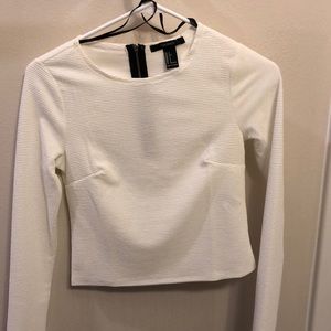 Ribbed Long Sleeve w/zipper on back.